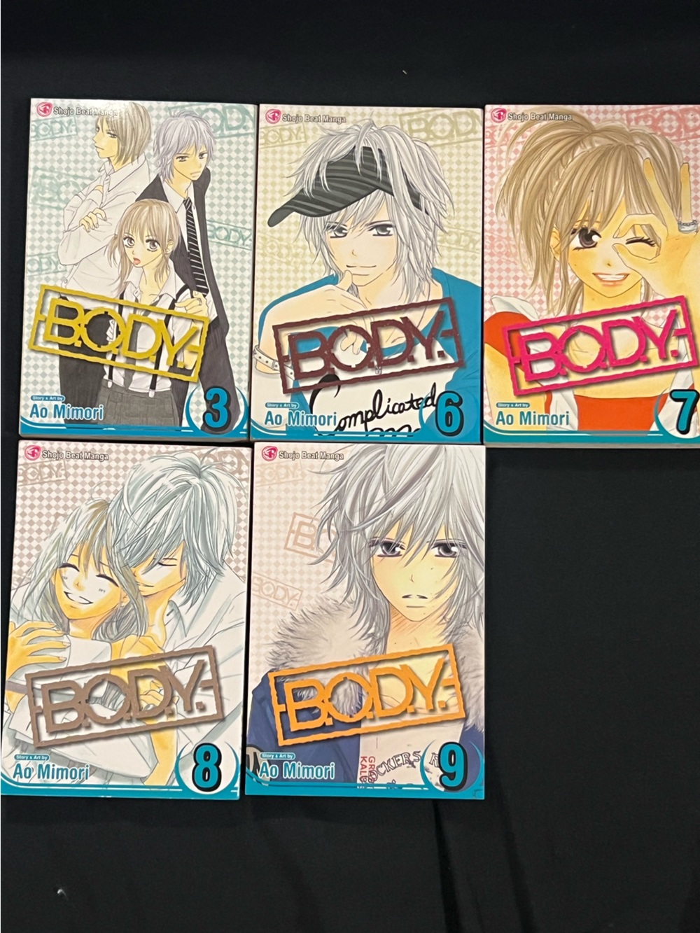B.O.D.Y. #Manga Volumes - Teal, White, Gray Covers